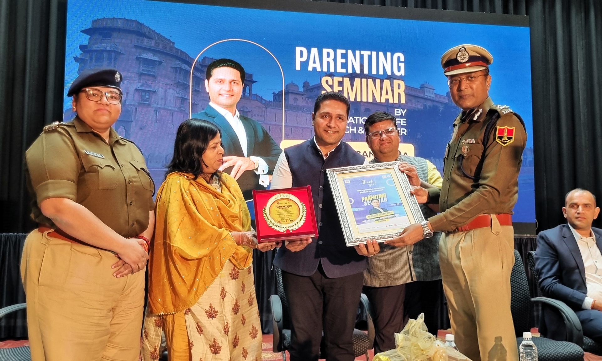 Indian parenting coach conducting a seminar workshop